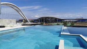 Indoor pool, seasonal outdoor pool, pool umbrellas, sun loungers