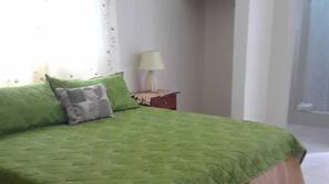 Blackout curtains, iron/ironing board, free WiFi, linens