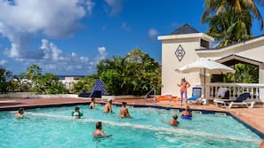Outdoor pool, pool umbrellas, sun loungers