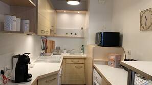 Microwave, coffee/tea maker, cookware/dishes/utensils