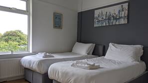 Premium bedding, iron/ironing board, free WiFi, linens