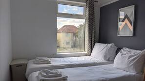 Premium bedding, iron/ironing board, free WiFi, linens
