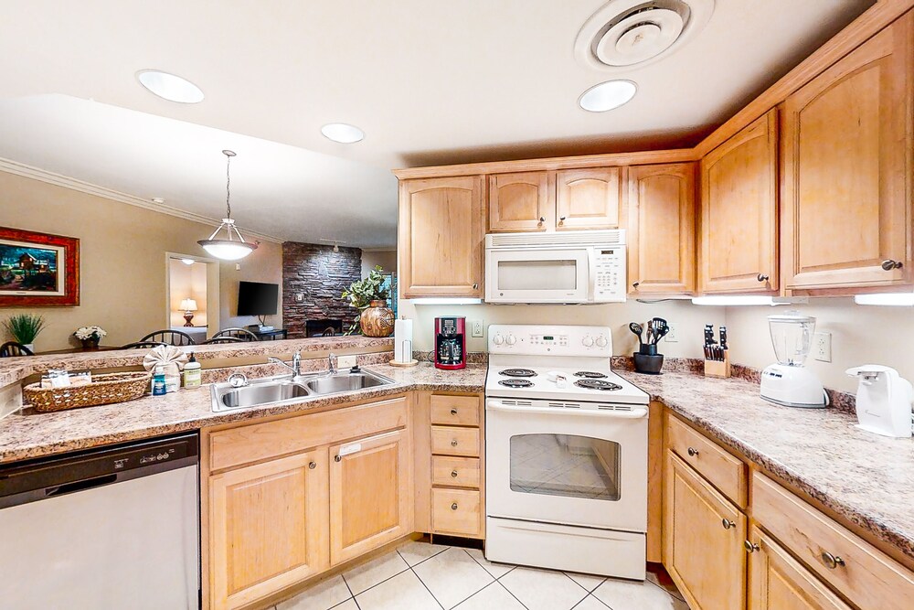 Inviting downtown condo w/ fireplace, balcony & shared pool/hot tub!