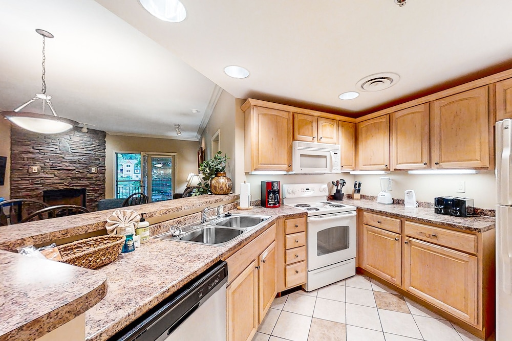 Inviting downtown condo w/ fireplace, balcony & shared pool/hot tub!