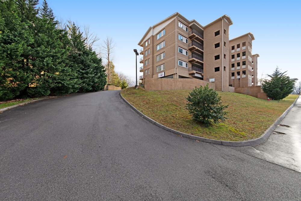 Luxury condo w/ forest & mountain views, a private balcony, & covered parking!