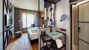 Down comforters, free minibar, in-room safe, laptop workspace