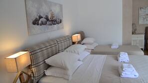 Egyptian cotton sheets, premium bedding, laptop workspace