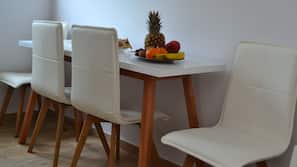 Mini-fridge, hob, electric kettle, high chair
