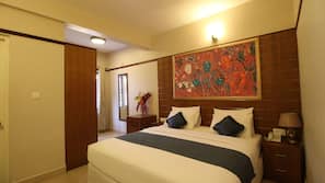 Premium bedding, down duvet, memory foam beds, in-room safe