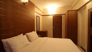 Premium bedding, down duvet, memory foam beds, in-room safe