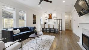 TV, fireplace, books