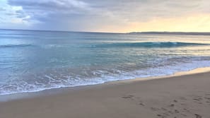 Beach nearby, white sand, sun loungers, beach umbrellas