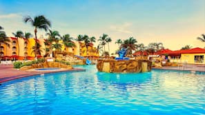 Outdoor pool, pool umbrellas, sun loungers