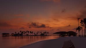 Private beach, white sand, sun loungers, beach towels