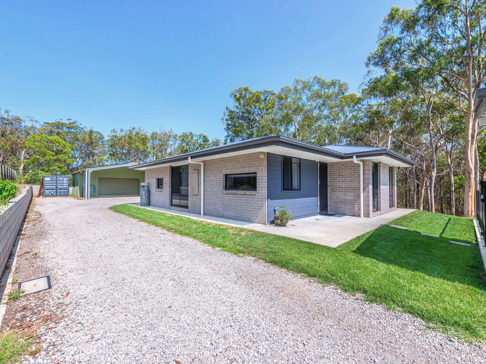 A tranquil bushland retreat with KB, Ducted AC and access to a heated pool.