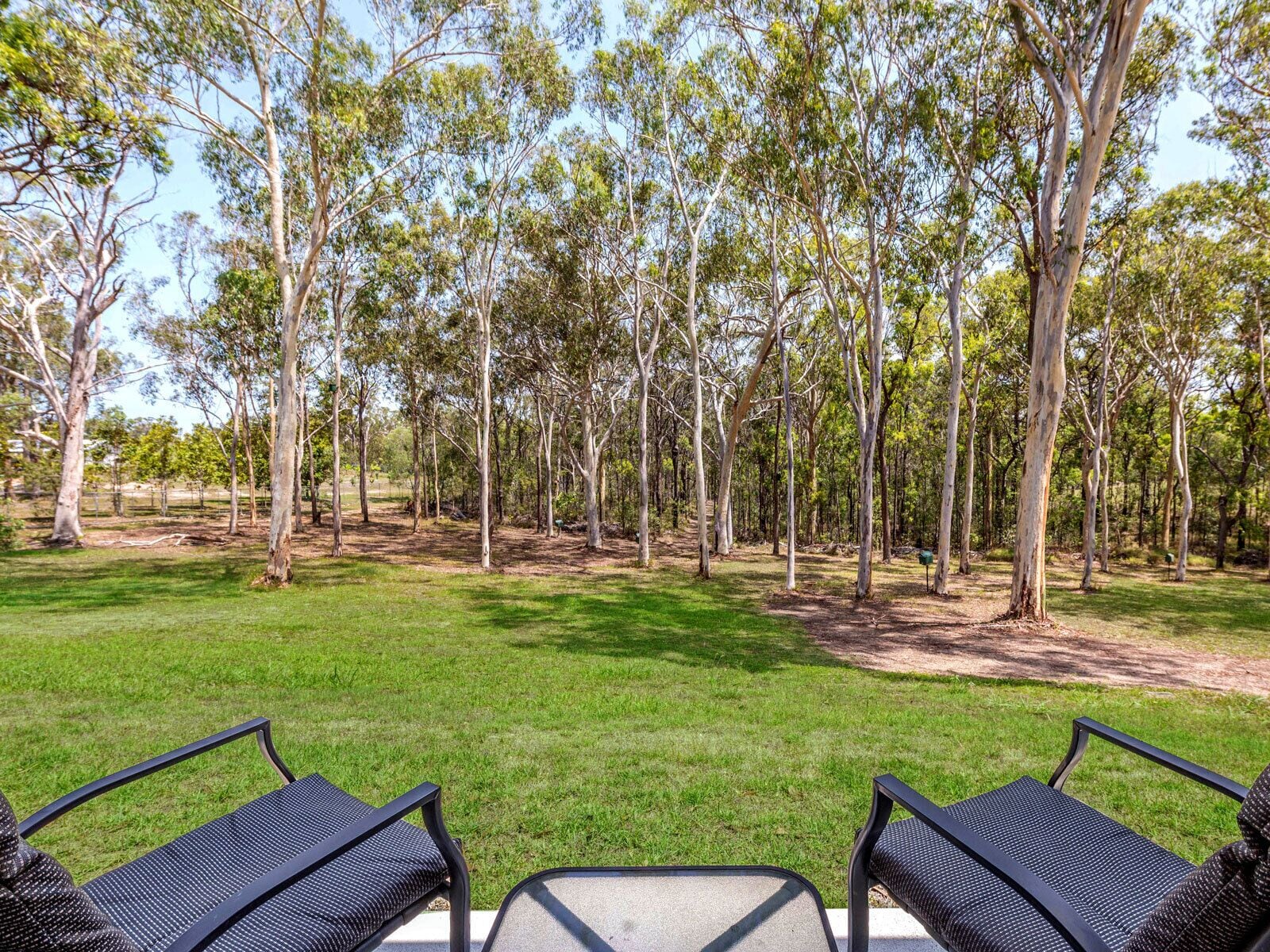 A tranquil bushland retreat with KB, Ducted AC and access to a heated pool.