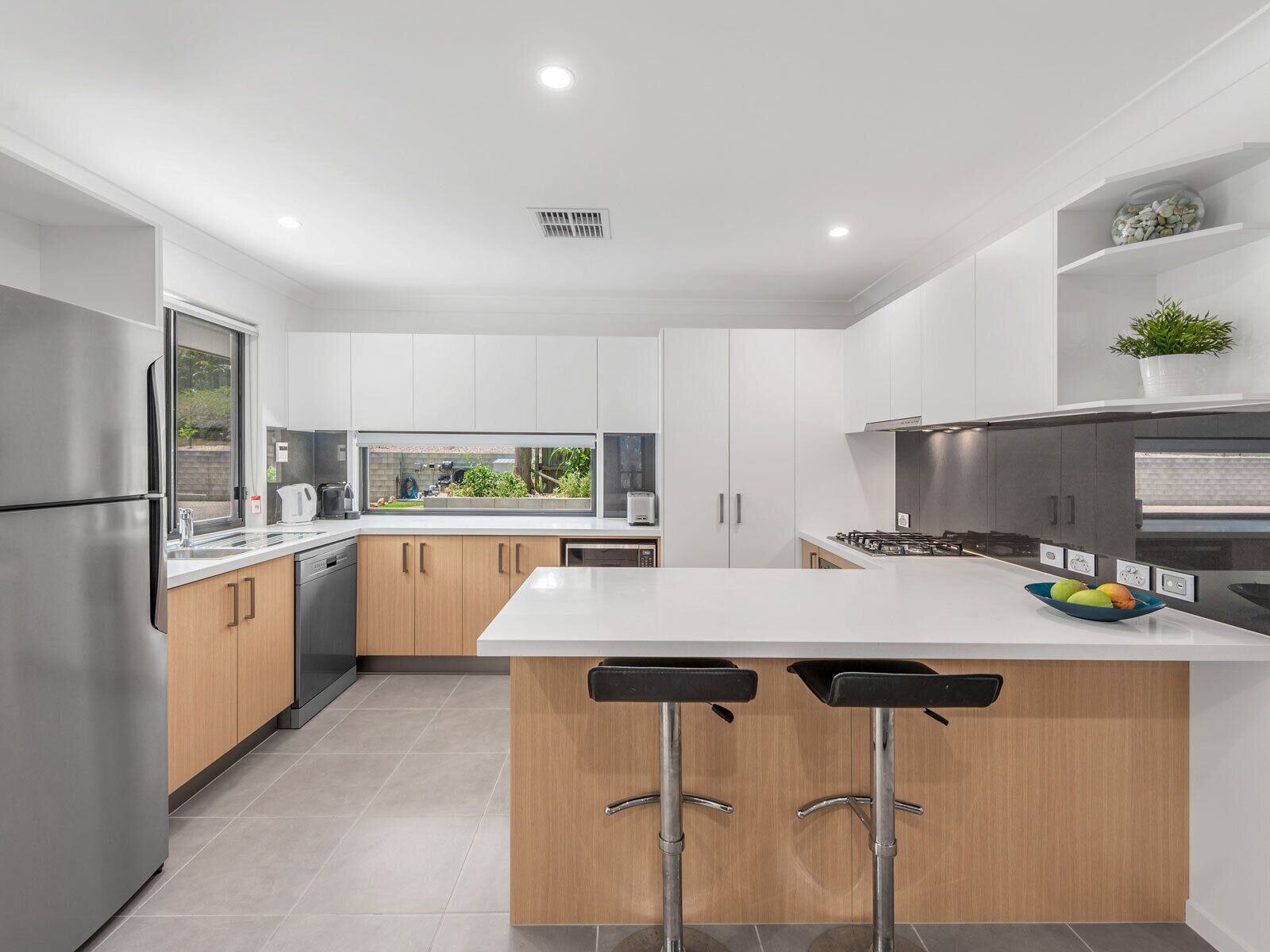 A tranquil bushland retreat with KB, Ducted AC and access to a heated pool.