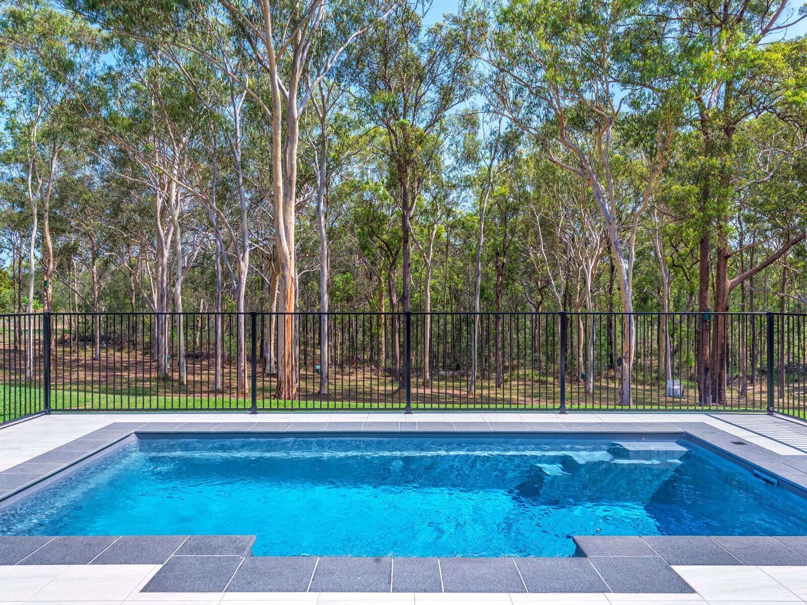 A tranquil bushland retreat with KB, Ducted AC and access to a heated pool.