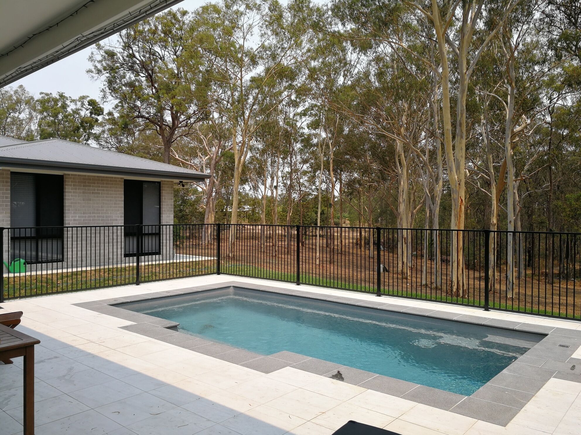 A tranquil bushland retreat with KB, Ducted AC and access to a heated pool.