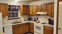 Microwave, dishwasher, coffee/tea maker, cookware/dishes/utensils