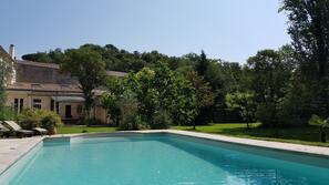Seasonal outdoor pool, pool umbrellas