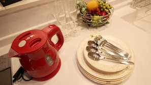 Fridge, microwave, stovetop, cookware/dishes/utensils