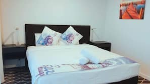 Premium bedding, iron/ironing board, free WiFi, linens