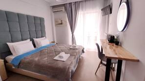 Blackout drapes, iron/ironing board, free WiFi, bed sheets