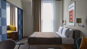 Premium bedding, down comforters, minibar, in-room safe