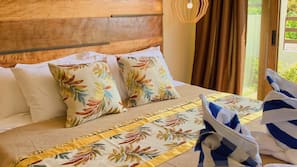 Desk, laptop workspace, bed sheets