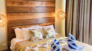 Desk, laptop workspace, bed sheets