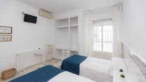 Laptop workspace, free WiFi, bed sheets