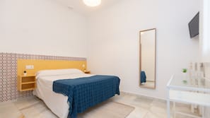 Laptop workspace, free WiFi, bed sheets