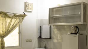 Mini-fridge, microwave, stovetop, electric kettle