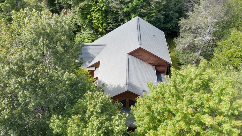 Cabin in the mountains with creek and elk located in Maggie Valley, NC.