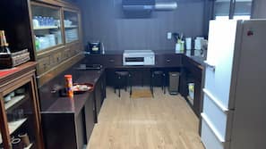Fridge, microwave, stovetop, coffee/tea maker