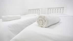 Blackout drapes, iron/ironing board, linens