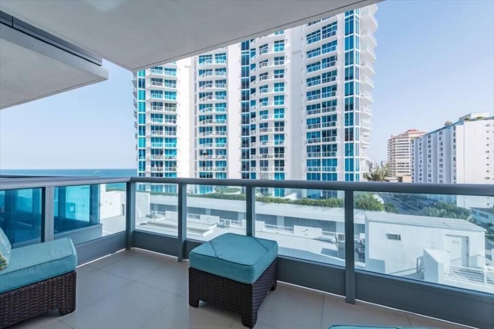 New Listing! Beachfront Condo-Hotel | Bay & City Views | Beach Access & Pool