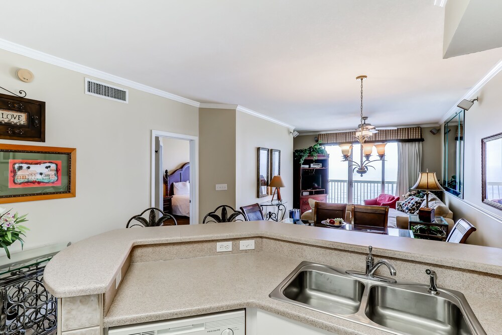 Eclectic gulf front condo w/ free WiFI, two pools, hot tub, & easy beach access!