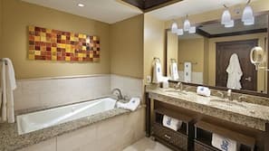 Bathtub, hair dryer, towels, soap