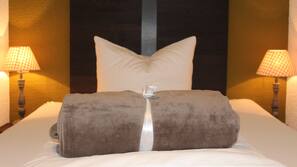 Blackout curtains, iron/ironing board, free WiFi, linens