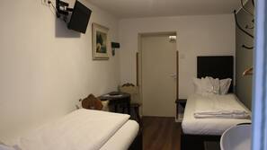 Blackout curtains, iron/ironing board, free WiFi, linens