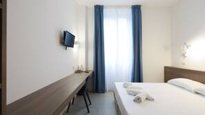 Een kluis op de kamer, verduisterende gordijnen, gratis wifi, beddengoed