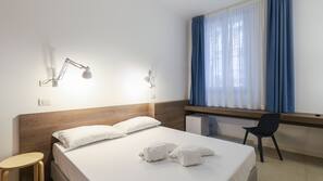 Een kluis op de kamer, verduisterende gordijnen, gratis wifi, beddengoed