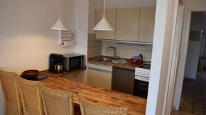 Fridge, microwave, hob, coffee/tea maker