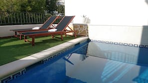 Outdoor pool, sun loungers