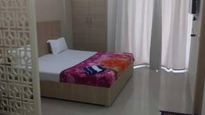 Premium bedding, Select Comfort beds, free minibar items, in-room safe