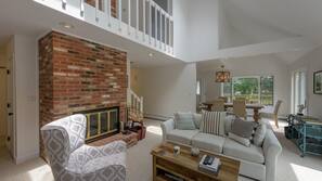 TV, fireplace, books
