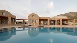 Outdoor pool, pool umbrellas, pool loungers