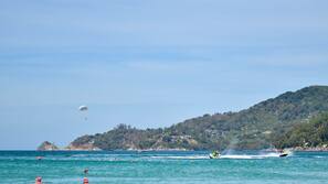 On the beach, white sand